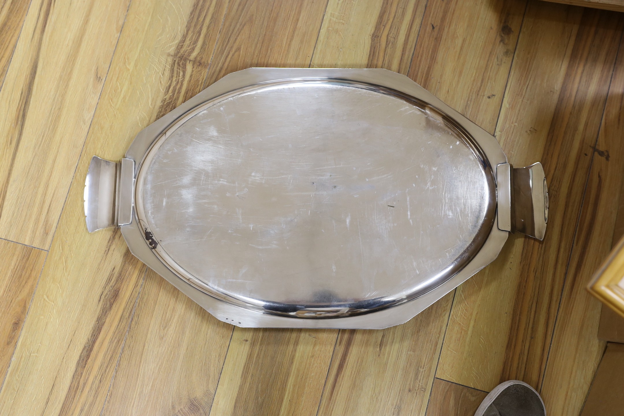 A large French silver plated two handled Art Deco tray. 74cm wide